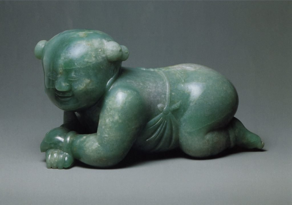 Oreiller en forme de petit garçon, jade, dynastie Qing (1644-1911)